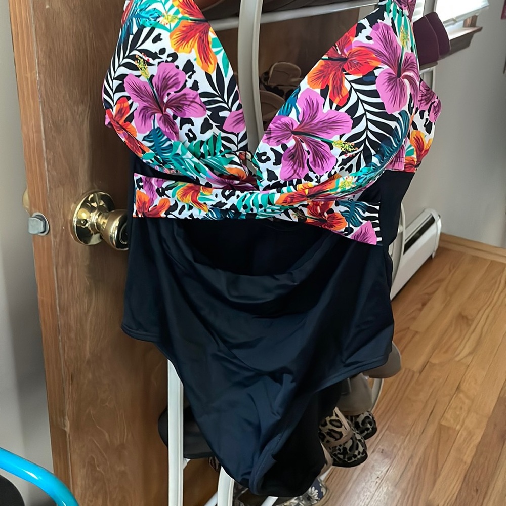 Brand new one piece swimsuit with cute cutouts and padded cups